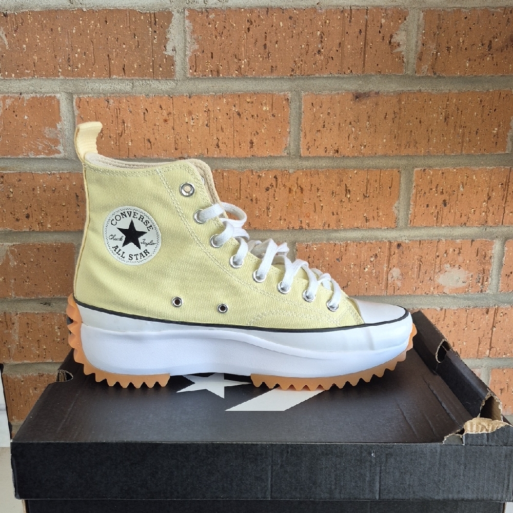 Converse Platform High-Tops in Yellow and White.